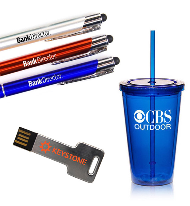 A variety of promotional products including pens, cups and a usb thumb drive.