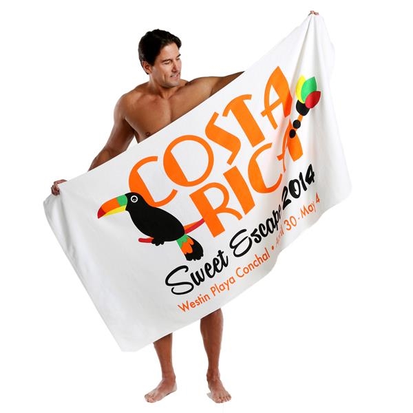 Man holding a Premium Velour, 35 x 70, Deluxe Heavyweight Beach Towel with a costa rica logo