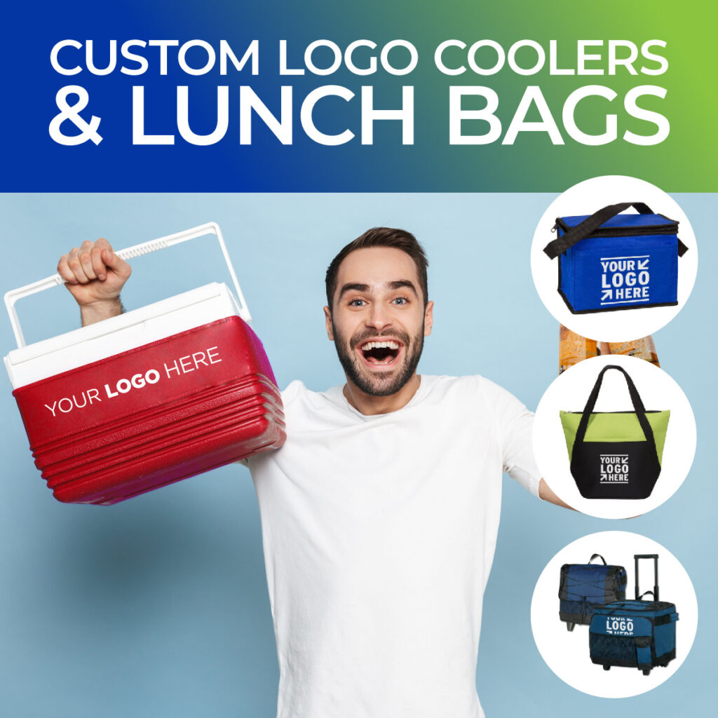 Young Man holding a custom logo cooler surrounded by personalized lunch bags.